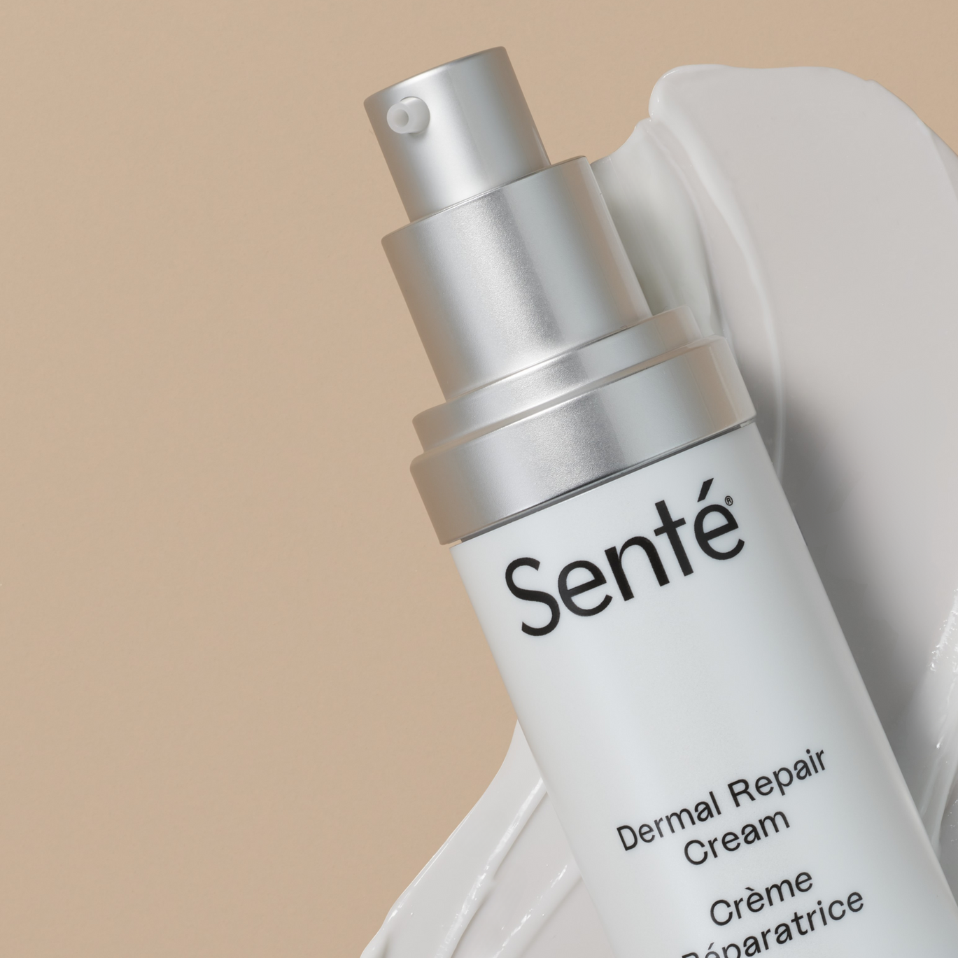 close of of dermal repair cream bottle with application behind